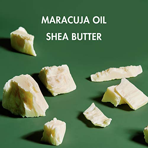 SheaMoisture Men Maracuja Oil and Shea Butter beard conditioning oil bottle with dropper applicator on white background.
