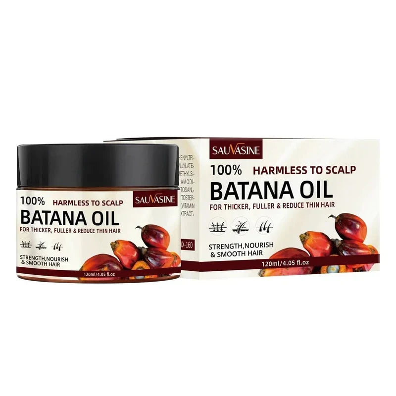 Bottle of Desert Hubs Batana Hair Oil (Original) with dark amber liquid in a clear container, suitable for nourishing hair.