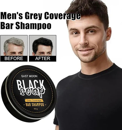 Black soap bar shampoo by East Moon, original formula, shown as a dark rectangular soap bar on a neutral background.