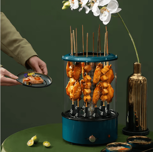 Bazaar E Arab electric rotating grill with stainless steel body and rotating skewers for even cooking.