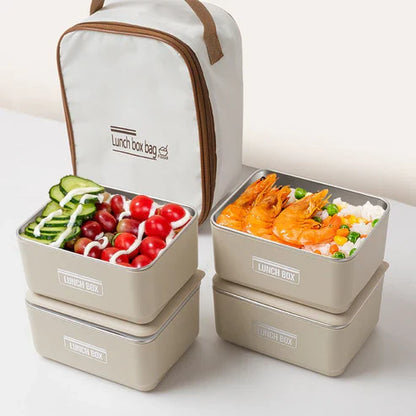 Insulated lunch box set with matching carry bag, featuring multiple compartments and a sturdy handle for easy carrying.